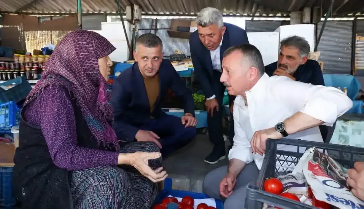 Büyükakın pazarda ürecilerle buluştu