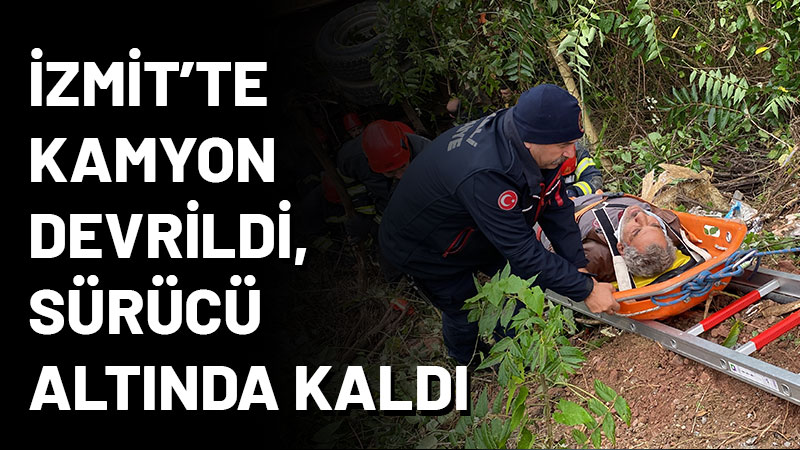 İzmit ilçesinde damperli kamyon virajı dönerken ağaçlık alana uçtu. Ağır