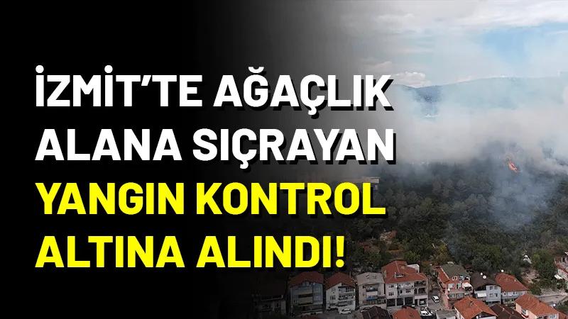 Kocaeli'nin İzmit ilçesinde ağaçlık alana sıçrayan yangın büyük kontrol altına